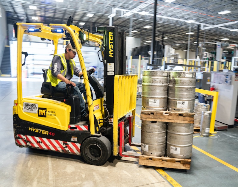 person-driving-yellow-forklift-1267337